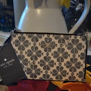 SOLD Kate Spade New York Small Zip Wristlet- Spade Flower Design NWTs